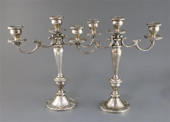 A pair of American Gorham sterling silver, two branch, three light candelabra, weighted.